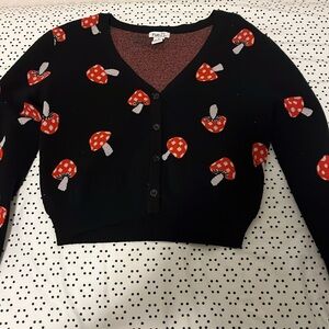 Used once mushroom cardigan size medium.